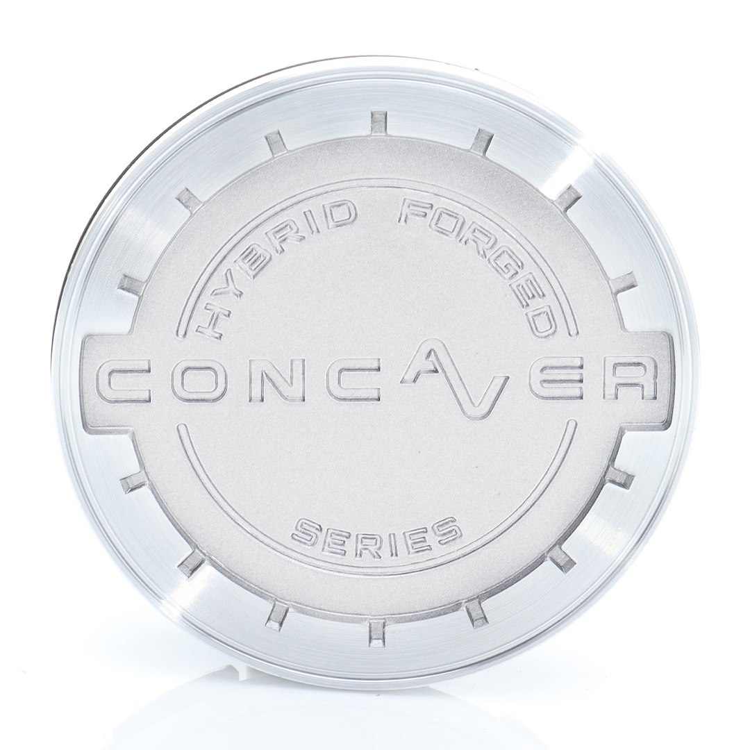 55307_0_39667jpg - OPSHOLDERS Round aluminum wheel center cap with raised inscription 'HYBRID FORGED' and 'CONCAVER SERIES' embossed across the center, shiny metallic finish.