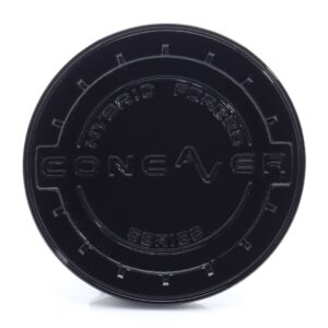 Close-up of a black round plastic cap with embossed text along the inner ring, including words like 'FORGED' and 'SERIES'.