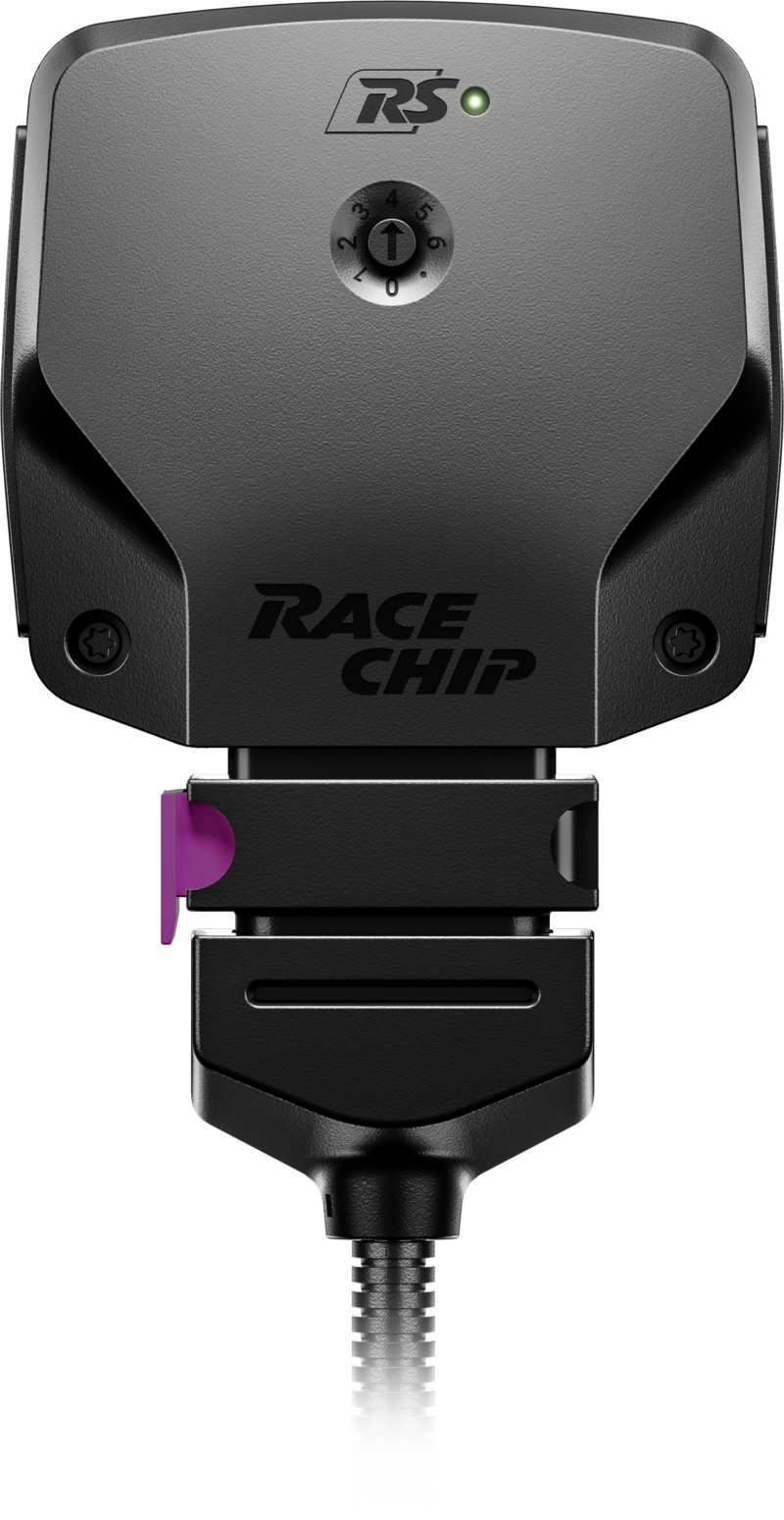 RS_render 4 - OPSHOLDERS Close-up of a RaceChip RS engine tuning module with a textured gray housing, logo, and a purple release lever on a plug-in mount, against a dark background.