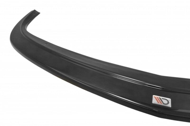 Black curved car bumper lip/spoiler with a small badge on the side, shown in profile against a white background.