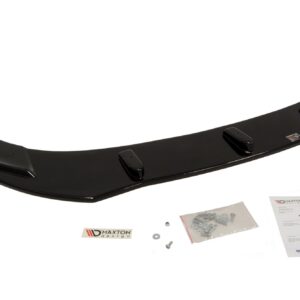 Glossy black rear car spoiler with three mounting feet and installation hardware laid out nearby