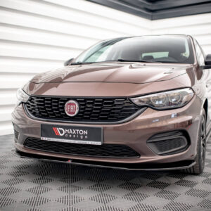 Bronze Fiat car front view with logo, grille and headlights in a showroom setting.