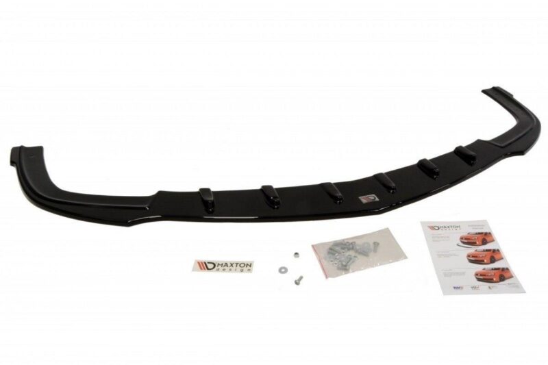 Long black curved car aero spoiler (rear lip) with mounting hardware and instruction sheets from Maxton Design