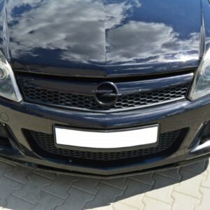 Front view of a black Opel car showing grille with logo, headlights, and a blank license plate.