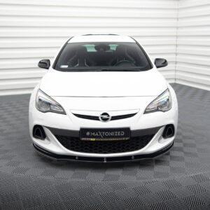 pol_po_FRONT-SPLITTER-suitable-for-Opel-ASTRA-J-OPC-VXR-v-1-837_2jpg - OPSHOLDERS Front view of a white Opel car in a studio with corrugated white walls; license plate reads #MAXTONIZED.
