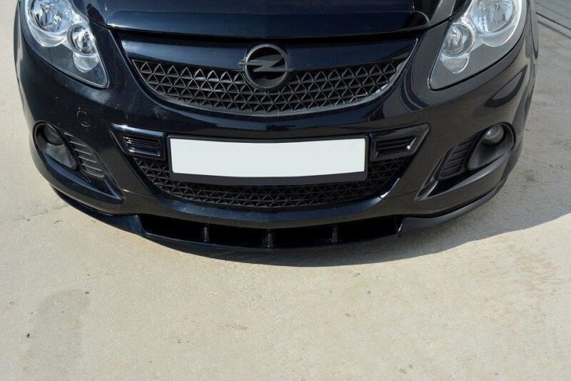 pol_po_FRONT-SPLITTER-suitable-for-Opel-CORSA-D-NURBURG-FOR-OPC-VXR-BUMPER-841_4jpg - OPSHOLDERS Front view of a black Opel car with emblem, grille, and a blank license plate.