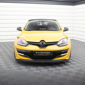 pol_po_FRONT-SPLITTER-suitable-for-Renault-MEGANE-3-RS-v-1-872_4jpg - OPSHOLDERS Front view of a bright yellow Renault car in a showroom, showing the grille and headlights, with '#MAXTONIZED' on the license plate area.