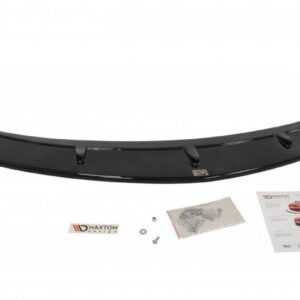 Black car rear spoiler with mounting hardware (screws, washers) and installation manual spread below it.
