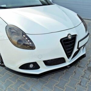 pol_po_Front-Splitter-V-1-suitable-for-Alfa-Romeo-Giulietta-415_3jpg - OPSHOLDERS White Alfa Romeo front view with black lower lip, parked on a brick driveway near a garage door.