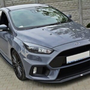 Front-left view of a gray Ford Focus RS parked on a paved driveway, showing the aggressive grille and LED headlights.
