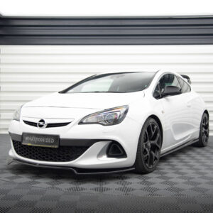 White Opel hatchback displayed in a bright showroom with white corrugated walls and a dark ceiling trim.
