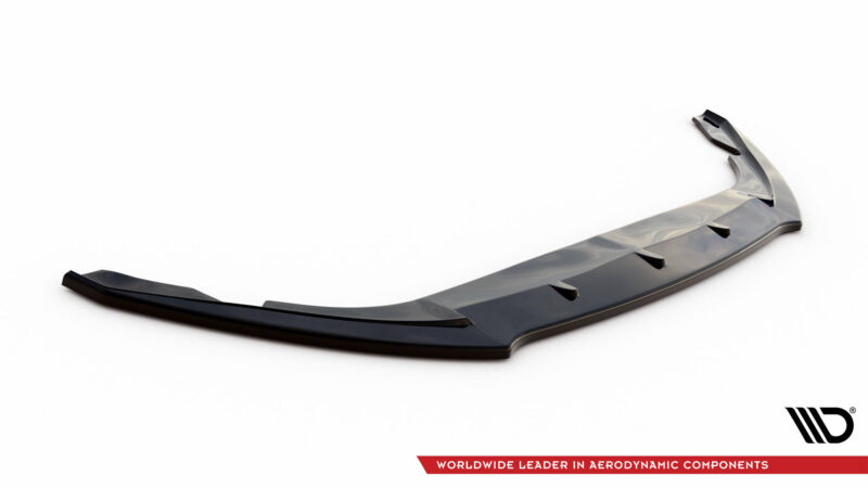 Glossy dark gray aerodynamic front splitter/spoiler with multiple vents, shown diagonally on a white background, logo and red banner text in the corner.”
