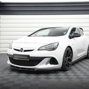 Front three-quarter view of a white Opel hatchback parked in a modern showroom with gray corrugated walls and a patterned floor.