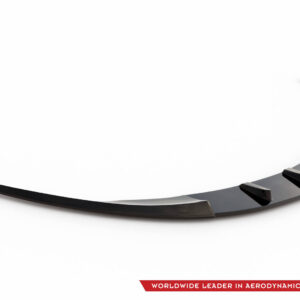 Curved glossy black aerodynamic component with angular facets on a white background, logo bottom-right and a red ribbon reading 'WORLDWIDE LEADER IN AERODYNAMIC COMPONENTS'