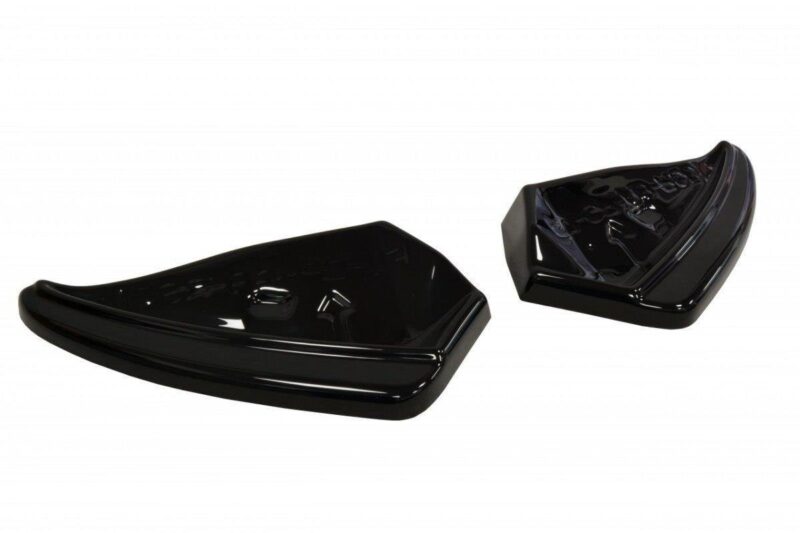 Pair of glossy black plastic automotive trim pieces, left and right, on a white background