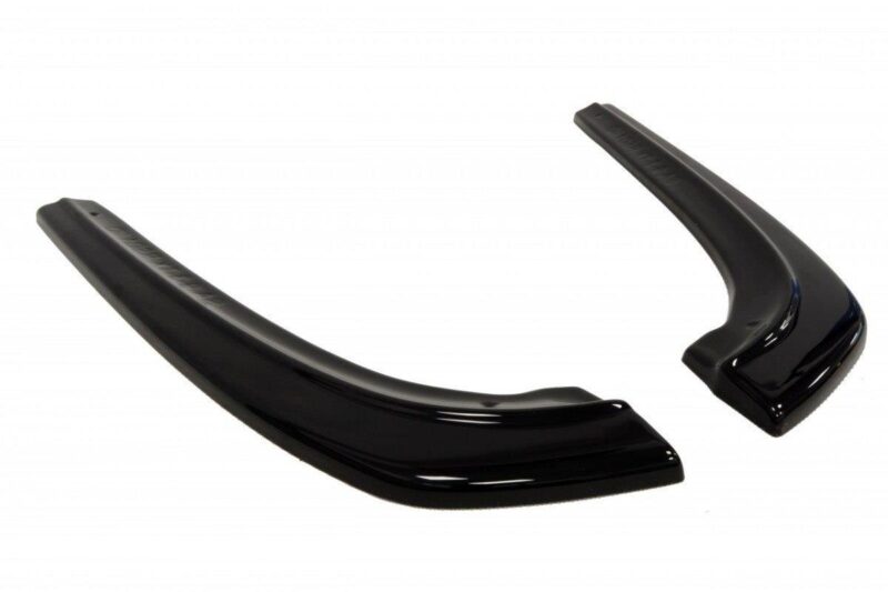 Two glossy black curved car aero fins laid on a white background, suggesting vehicle spoiler components.