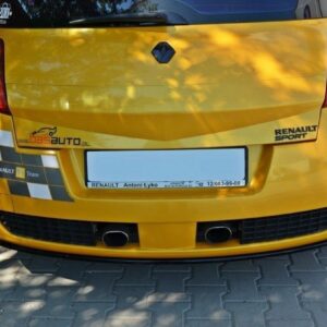 Rear view of a bright yellow Renault with Renault Sport badge and racing graphics on the trunk.