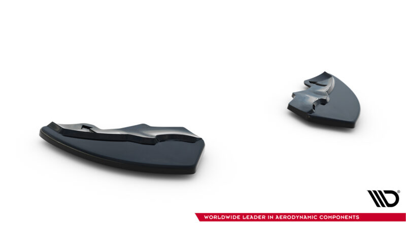 Two glossy black aerodynamic components, broken apart on a white background, with a red banner reading 'Worldwide Leader in Aerodynamic Components' at the bottom-right.