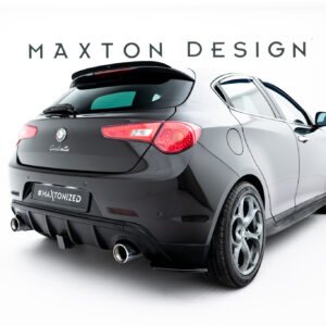 Rear three-quarter view of a dark gray Alfa Romeo Giulietta in a white studio with Maxton Design branding above and a #MAXTONIZED plate badge below