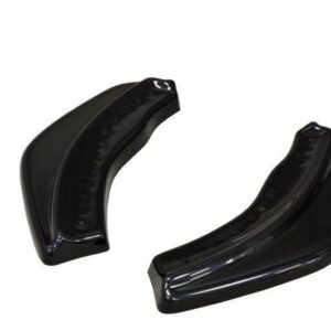 Two glossy black curved plastic trim pieces on a white background, likely automotive body parts.