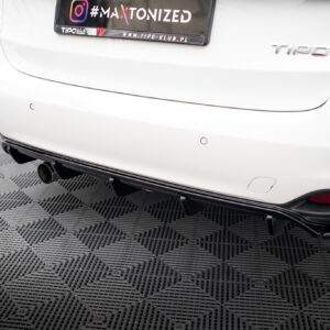 pol_po_Rear-Valance-suitable-for-Fiat-Tipo-S-Design-SW-5801_5jpg - OPSHOLDERS White car rear bumper with visible circular parking sensors, dual exhaust, and a license plate frame reading TIP0 klub on a checkered floor.