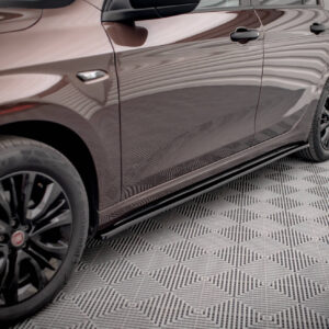 Side view of a brown car showing front and rear doors, black alloy wheels, and glossy reflections on the paint in a showroom setting.