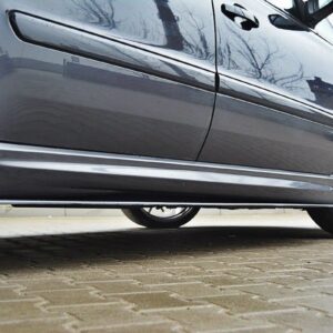 pol_po_SIDE-SKIRTS-DIFFUSERS-suitable-for-Opel-ZAFIRA-B-OPC-254_2jpg - OPSHOLDERS Low-angle side view of a gray car with aftermarket alloy wheels parked on a brick driveway