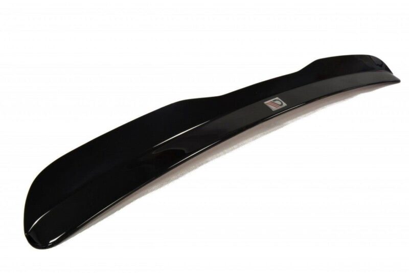 Glossy black rear car spoiler with a small emblem on a white background.