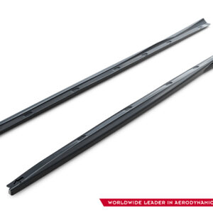 pol_po_Side-Skirts-Diffusers-V-1-suitable-for-Alfa-Romeo-Giulietta-601_5jpg - OPSHOLDERS Two dark roof rack rails with mounting holes, angled across a white background for a vehicle accessory image,