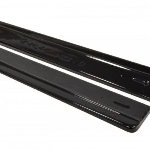 pol_po_Side-Skirts-Diffusers-suitable-for-Alfa-Romeo-147-GTA-76_4jpg - OPSHOLDERS Two black glossy car side step rails on a white background, shown together.