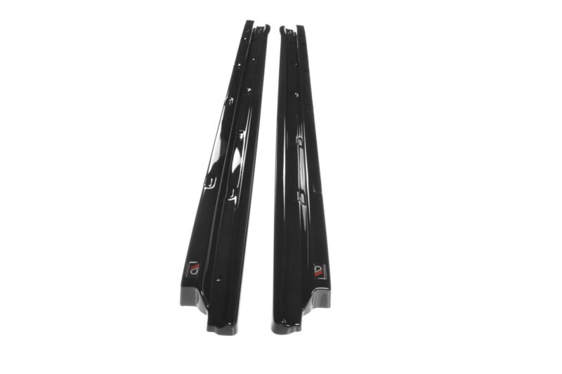 Pair of black windshield wiper blades displayed upright against a white background, showing their curved edges and mounting ends.