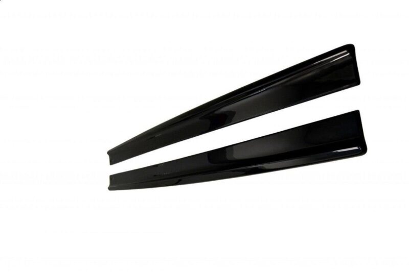 pol_po_Side-Skirts-Diffusers-suitable-for-Fiat-Stilo-Schumacher-2784_5jpg - OPSHOLDERS Black hair straightener lying diagonally on a white background.