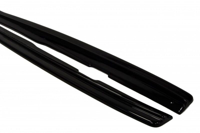 Pair of black windshield wiper blades laid out side by side on a white background