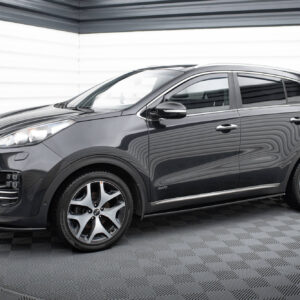 Grey SUV parked in a showroom with metallic paint and large alloy wheels, AWD badge visible on the side.