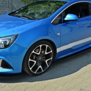 Blue sports hatchback car photographed from the front-left side, parked on a paved surface with glossy alloy wheels.