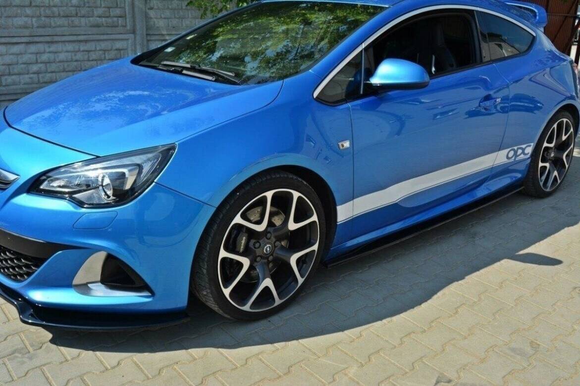 pol_po_Side-Skirts-Diffusers-suitable-for-Opel-Astra-OPC-VXR-J-242_1jpg - OPSHOLDERS Blue sports hatchback car photographed from the front-left side, parked on a paved surface with glossy alloy wheels.