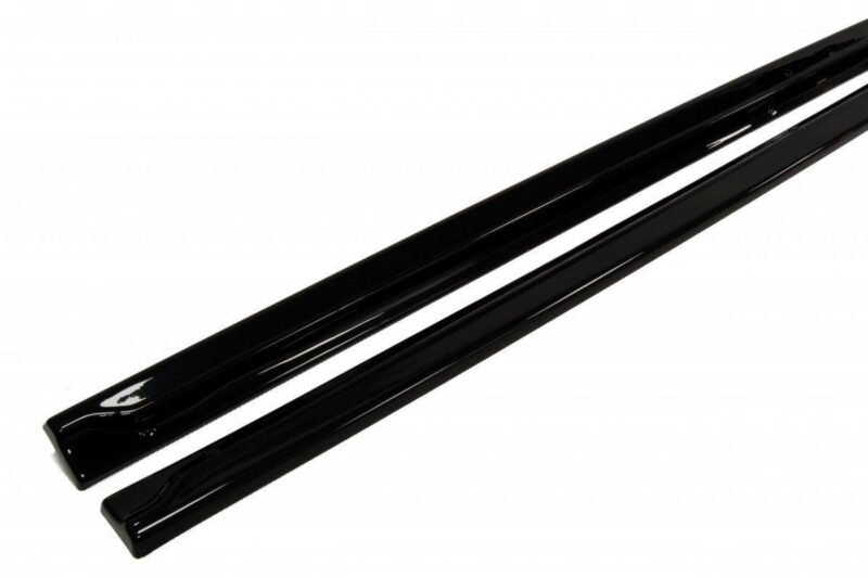 pol_po_Side-Skirts-Diffusers-suitable-for-Renault-Megane-RS-Mk2-276_5jpg - OPSHOLDERS Two black glossy rails laid diagonally on a white background, close-up view