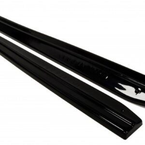 Two black car windshield wiper blades lying parallel on a white background