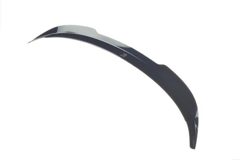 pol_po_Spoiler-Cap-suitable-for-Suzuki-SWIFT-6-SPORT-8255_4jpg - OPSHOLDERS Close-up of a curved aircraft propeller blade with a dark finish and silver leading edge set against a white background.